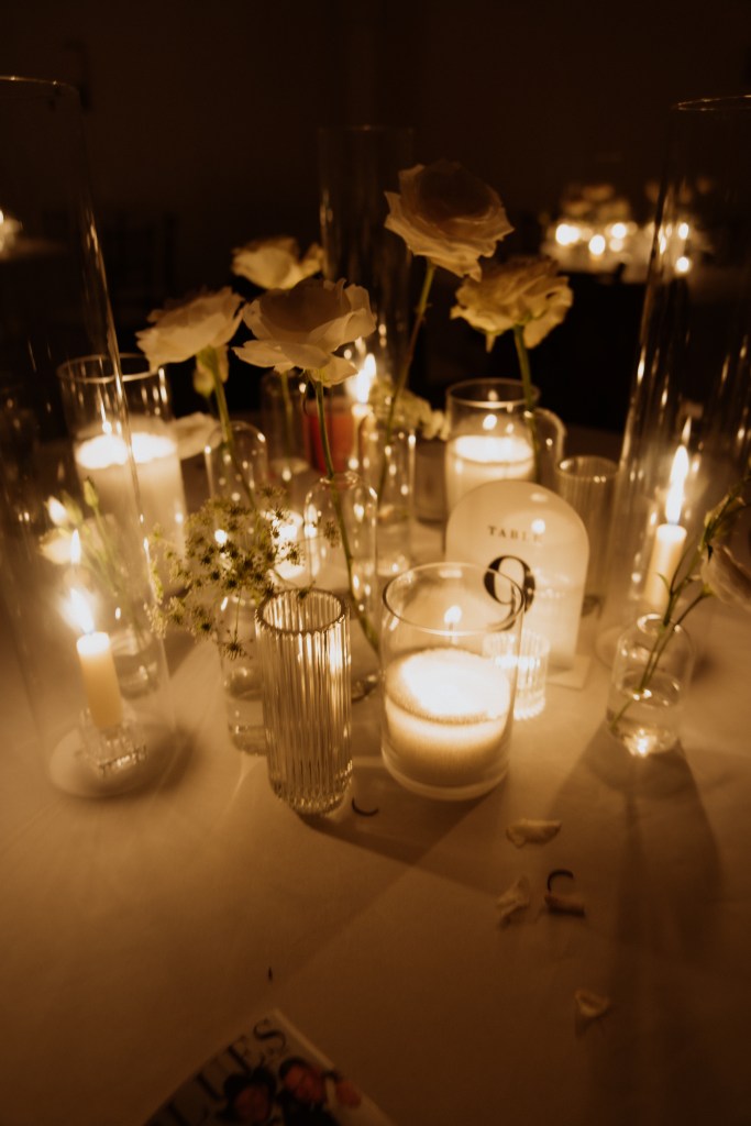 granulated wax sand candles glowing at Nashville wedding