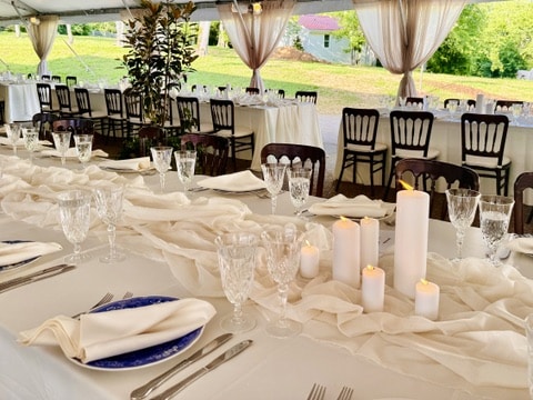 Pillar Candles on a farm table 

