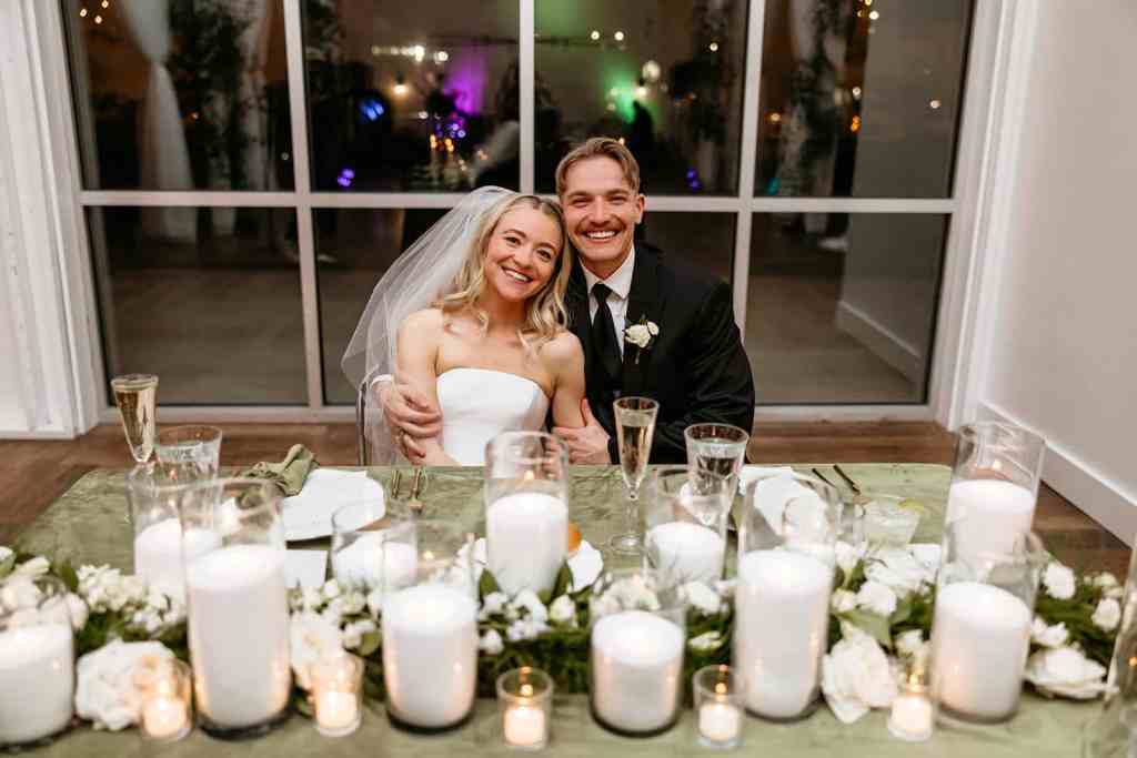 candlelit sweetheart table setup by Nashville Candle Rentals